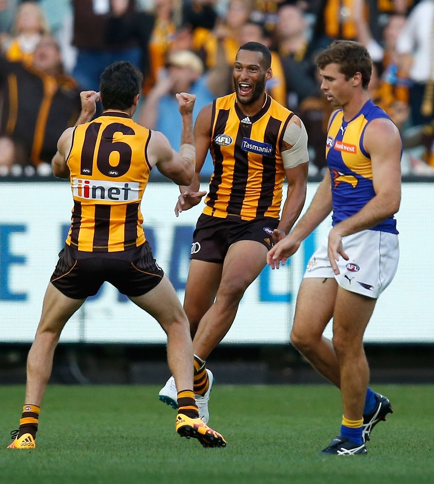 AFL 2016 Rd 02 - Hawthorn v West Coast MELBOURNE, AUSTRALIA - APRIL 3: Josh Gibson of the Hawks celebrates his first goal for the Hawks with Isaac Smith (left) during the 2016 AFL Round 02 match between the Hawthorn Hawks and the West Coast Eagles at the Melbourne Cricket Ground, Melbourne on April 3, 2016. (Photo by Michael Willson/AFL Media)